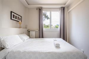 En eller flere senge i et værelse på Lou Pichot par Dodo à Cassis