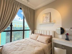 a bedroom with a bed and a large window at Setia Sky 88 by Cactus Homestay THM in Johor Bahru +128 photos