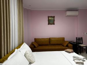 Postel nebo postele na pokoji v ubytování Hotel Erta