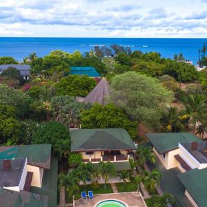 an aerial view of a resort with the ocean at Modern Girasoli Suites 08 in Malindi