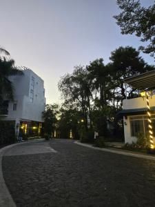 an empty street in front of a building at JnF Suites Tagaytay in Tagaytay