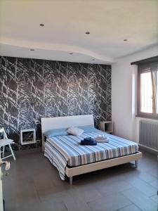 Postel nebo postele na pokoji v ubytování Vittoria House