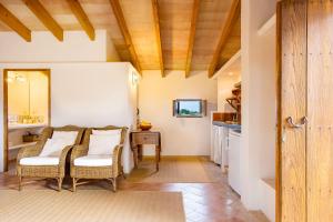 TV a/nebo společenská místnost v ubytování Finca Son Josep de Baix