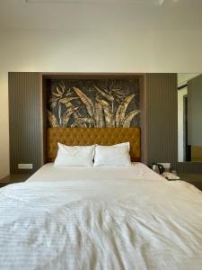 Postel nebo postele na pokoji v ubytování Mannat Resort