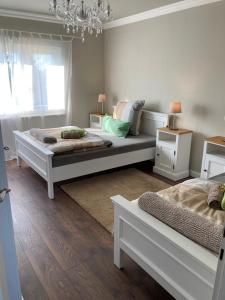 Katil atau katil-katil dalam bilik di Friendly Home - Sonnenhof