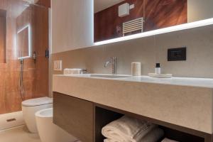 Koupelna v ubytování Le Torri Suites