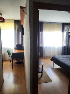 Postel nebo postele na pokoji v ubytování Narva Apartments