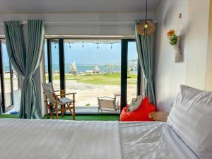 Ένα ή περισσότερα κρεβάτια σε δωμάτιο στο Long Vĩ hotel - đảo Phú Quý +86 φωτογραφίες