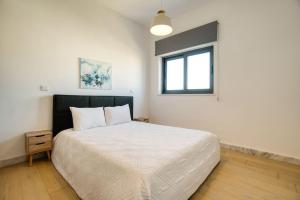 Ένα ή περισσότερα κρεβάτια σε δωμάτιο στο Pafia City 2 - 402 1 BED