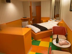 Postel nebo postele na pokoji v ubytování Hotel MGM