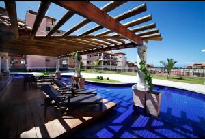 Uma varanda ou terraço em Beverly Hills-Porto das Dunas-Cobertura