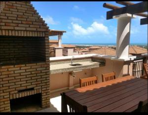 Uma varanda ou terraço em Beverly Hills-Porto das Dunas-Cobertura