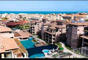 A piscina localizada em Beverly Hills-Porto das Dunas-Cobertura ou nos arredores