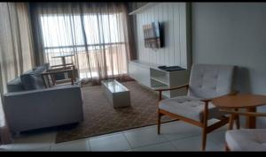 Uma área de estar em Beverly Hills-Porto das Dunas-Cobertura