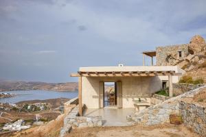 a house on top of a hill with a view at Great View, Small Villa in Rámos