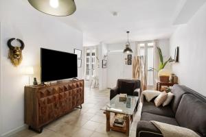 Televiisor ja/või meelelahutuskeskus majutusasutuses Casa las Caracolas