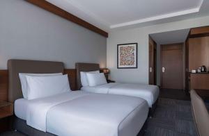 Cama ou camas em um quarto em Radisson Blu Hotel Ankara Cankaya