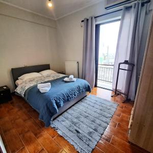 Postel nebo postele na pokoji v ubytování Horizon apartment Athens near to Acropolis, sea & subway