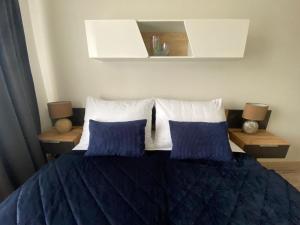 Postel nebo postele na pokoji v ubytování Spacy Modern Apartment near Hockey Stadium