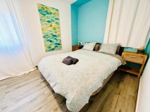 Posteľ alebo postele v izbe v ubytovaní Casa Gracia Stylish apartment close to the beach BY NAMASTE ELITE