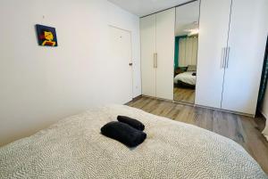 Posteľ alebo postele v izbe v ubytovaní Casa Gracia Stylish apartment close to the beach BY NAMASTE ELITE