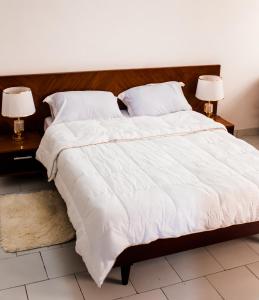 Ένα ή περισσότερα κρεβάτια σε δωμάτιο στο Appartement