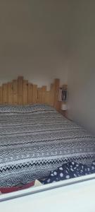 拉贝尔讷里昂雷茨Appartement vue mer的卧室的模型,卧室里的床 更多27张照片