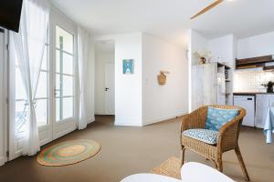 A cozinha ou kitchenette de La Dune, appart familial vue mer