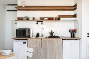 Kjøkken eller kjøkkenkrok på Les Pins, studio vue mer