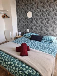Posteľ alebo postele v izbe v ubytovaní Le Bocage gîte 90m2 chaleureux à 4 min du Puy du Fou