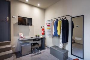 TV a/nebo společenská místnost v ubytování Dea's Rooms