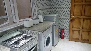 ครัวหรือมุมครัวของ MC Self Catering