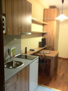 A kitchen or kitchenette at Residence Desenzano