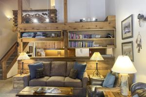 a living room with a couch and a table at 3622 Winterberry in Wilson