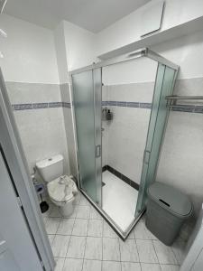 a bathroom with a shower and a toilet at Frejus Plage in Fréjus