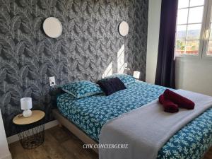 Posteľ alebo postele v izbe v ubytovaní Le Bocage gîte 90m2 chaleureux à 4 min du Puy du Fou