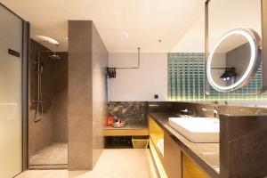 Vannituba majutusasutuses Liangzhi Huipin Hotel Haikou West Coast Yongwan Road Branch