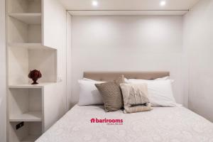 Postel nebo postele na pokoji v ubytování Barirooms - Crisanzio Suites