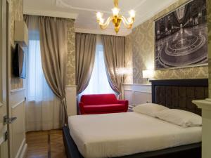 Posteľ alebo postele v izbe v ubytovaní Duomo Rooms
