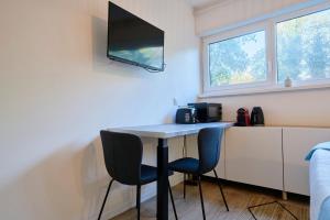 Et tv og/eller underholdning på Studio tout confort