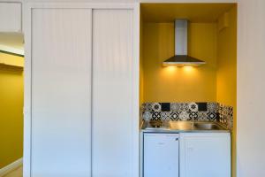 Køkken eller tekøkken på Studio tout confort + 8 billeder