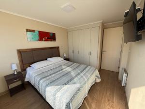 Postel nebo postele na pokoji v ubytování Departamento Chillan céntrico