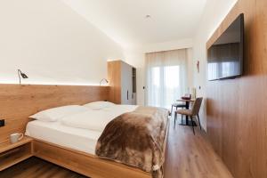 Postel nebo postele na pokoji v ubytování Gästehaus Salvatorianerinnen + 37 fotografií