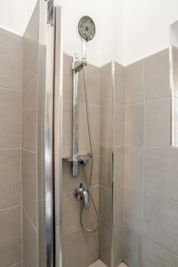 A bathroom at Tirelli Apartment Roma