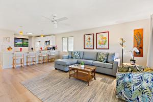 a living room with a couch and a table at Kaanapali Plantation 6 in Lahaina