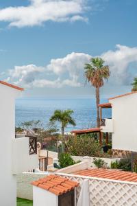 a view of the ocean from a house at Wonderful holiday home with seaview and jacuzzi in Puerto de las Nieves