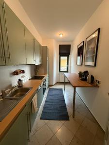 Η κουζίνα ή μικρή κουζίνα στο Wohnung in Leipzig Waldstraße