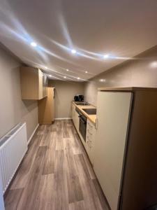 Η κουζίνα ή μικρή κουζίνα στο Daytona Monteur Apartment +1 φωτογραφίες