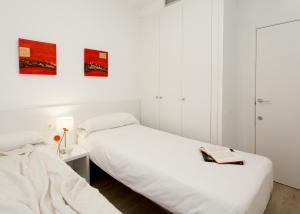 Posteľ alebo postele v izbe v ubytovaní 08028 Apartments + 37 fotografií
