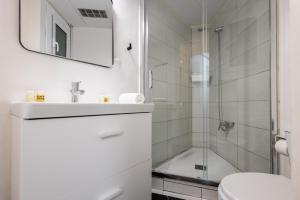 Un baño de Stay U-nique Apartment Rossello II
